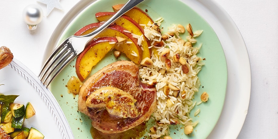 Eendenmedaillons Rossini met mango, pilafrijst met amandelen en specerijen
