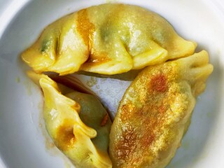 Gyoza met varkensvlees  en groenekool