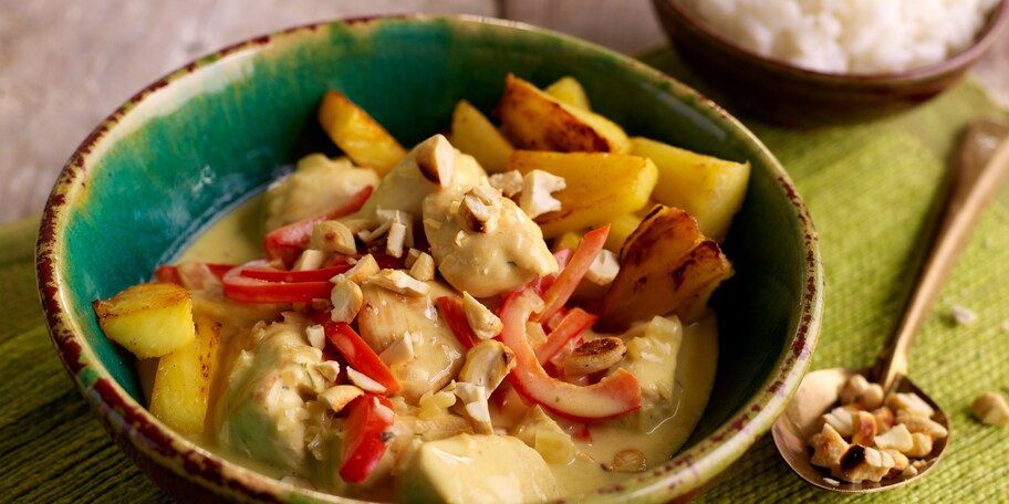 Curry van kip met ananas en cashewnoten