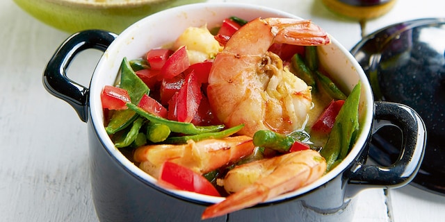 Curry van scampi en kokos