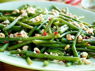 Salade van sperziebonen en cashewnoten, pittige vinaigrette met sesam