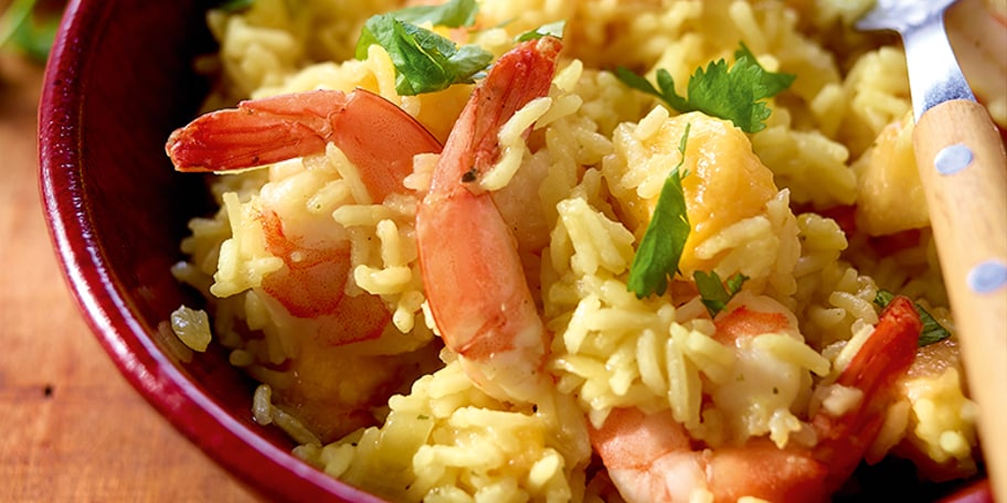 Pilaf aux pêches et aux scampis