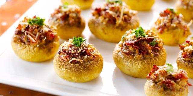 Gevulde champignons met pancetta en Parmezaanse kaas