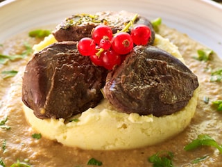 Filets de pigeon aux pommes et au calvados