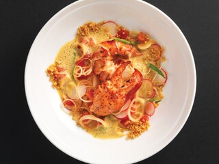 Sauté van kreeft met dragon en parfums van citrusvruchten