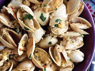 Schelpdieren met amandelen en sinaasappel