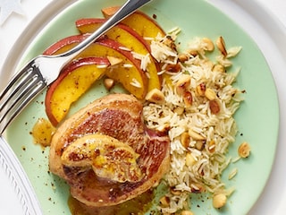 Médaillons de canard Rossini à la mangue, pilaf aux amandes et aux épices