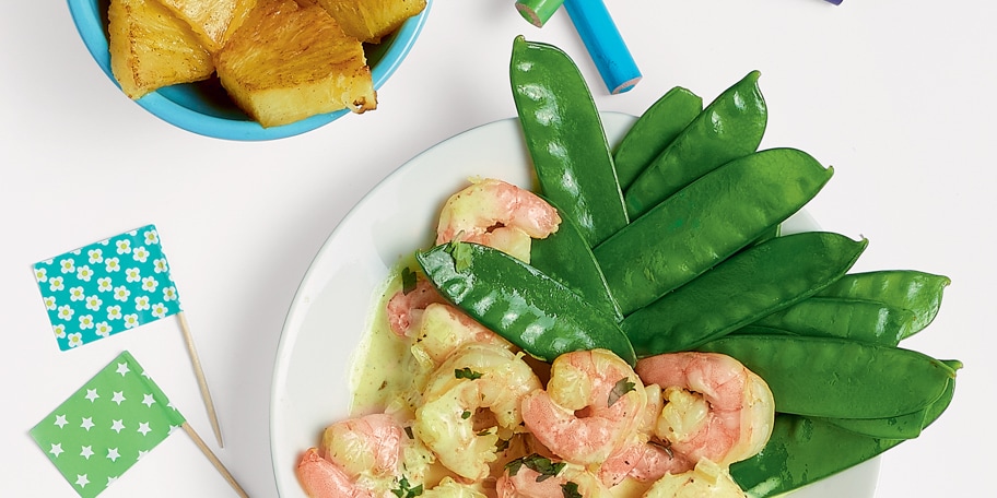 Crevettes au curry doux, mange-tout et ananas poêlé