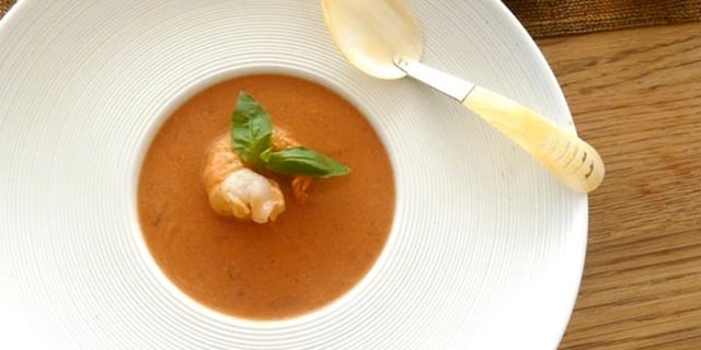 Chowder met scampi’s en basilicum