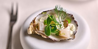 Oester met sint-jakobsnoot en groene appel