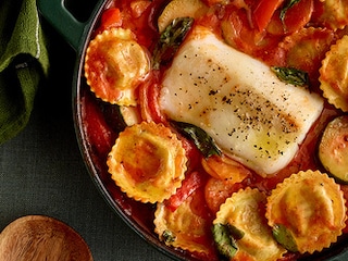 Kabeljauwhaasje met girasoli en tomatensaus