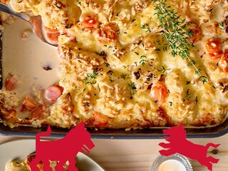 Gegratineerde pasta met spinazie en champignons