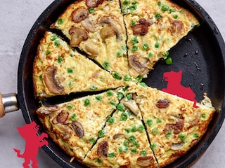 Frittata aux champignons, petits pois et ricotta