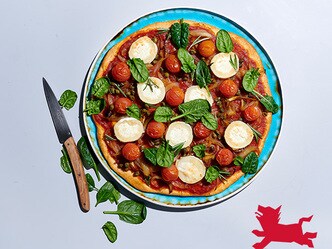 Pizza au chèvre, oignons caramélisés et tomates cerise
