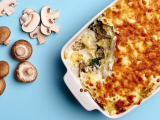 Pasticcio van tortellini met champignons en ricotta  