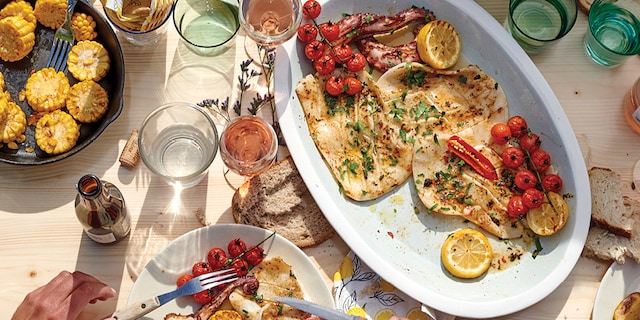 Calamars et pattes de poulpe grillés, tomates cerises rôties