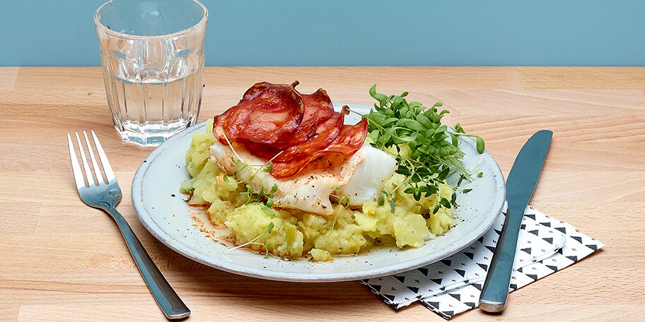 Kabeljauwhaasje met chorizo en preistoemp met olijfolie