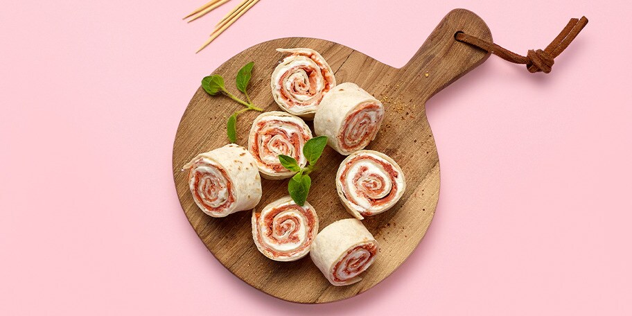 Rouleaux de spianata au fromage doux et à l’huile aromatisée d’ail