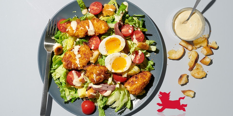 Caesarsalade met krokante kipnuggets