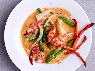 Nage de homard aux petits légumes