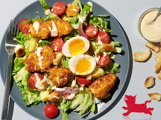 Caesarsalade met krokante kipnuggets