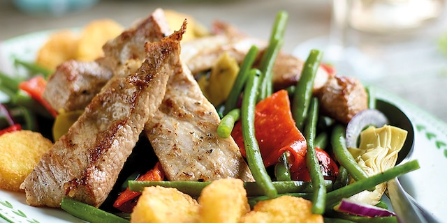Secreto Iberico avec haricots et légumes grillés