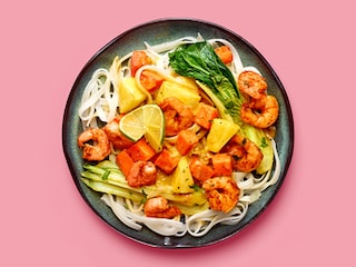 Vollenbak curry met scampi en rijstnoedels