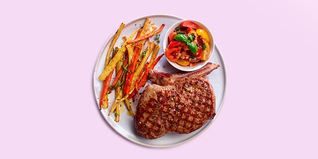 Côte à l’os met tomatensalade
