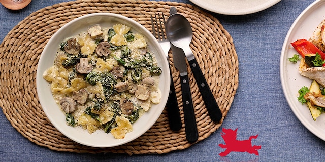 Farfalle met 3 kazen, spinazie en champignons