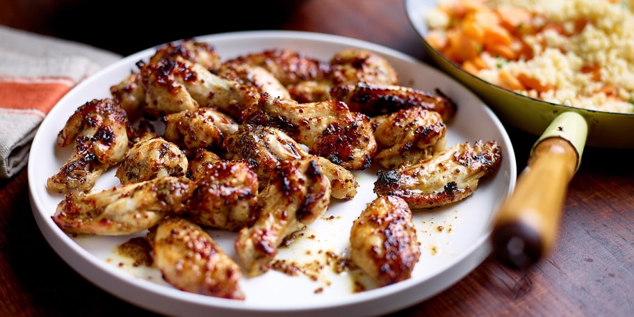 Ailes de poulet miel-moutarde et blé aux carottes